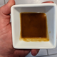 lizano salsa in dipping cup